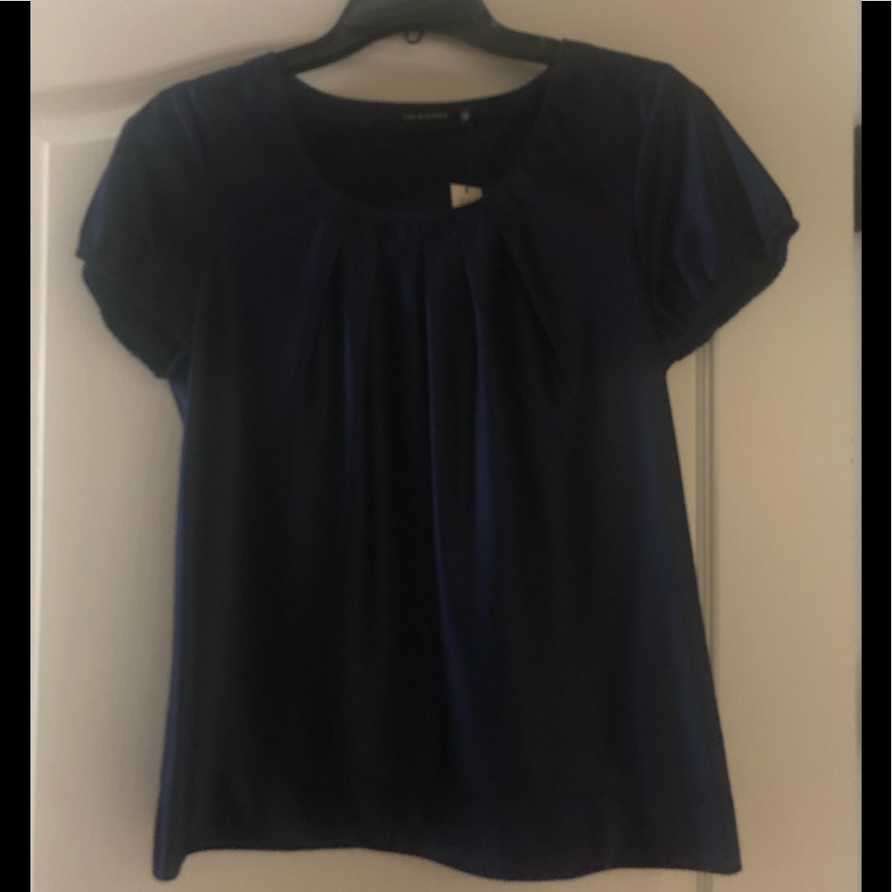 The limited Small Shiny Blue Blouse.